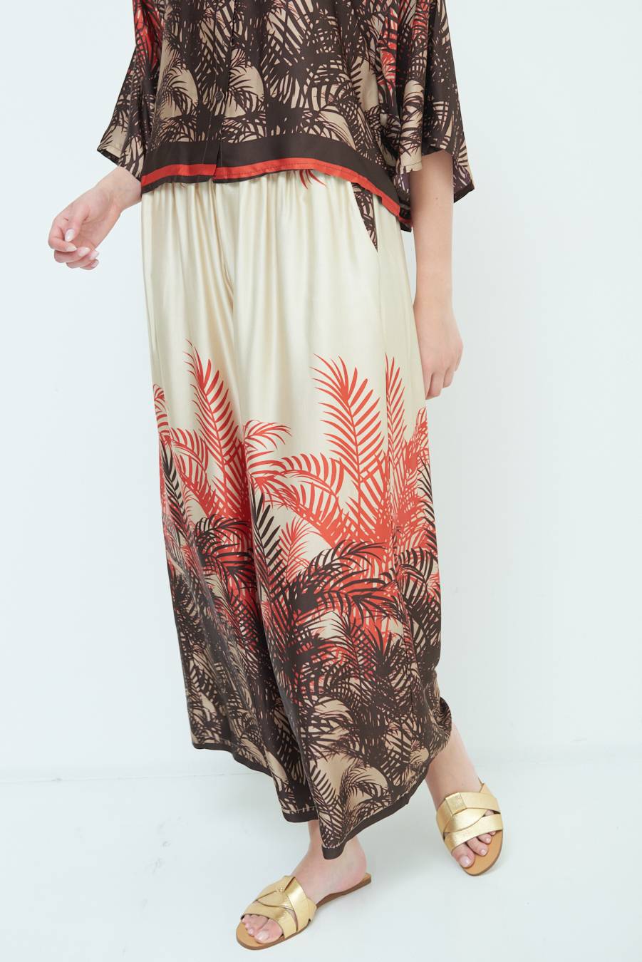 Kikisix PANTALONE PALAZZO FANTASIA BALZA MORO/ARANCIO Pezzi Unici