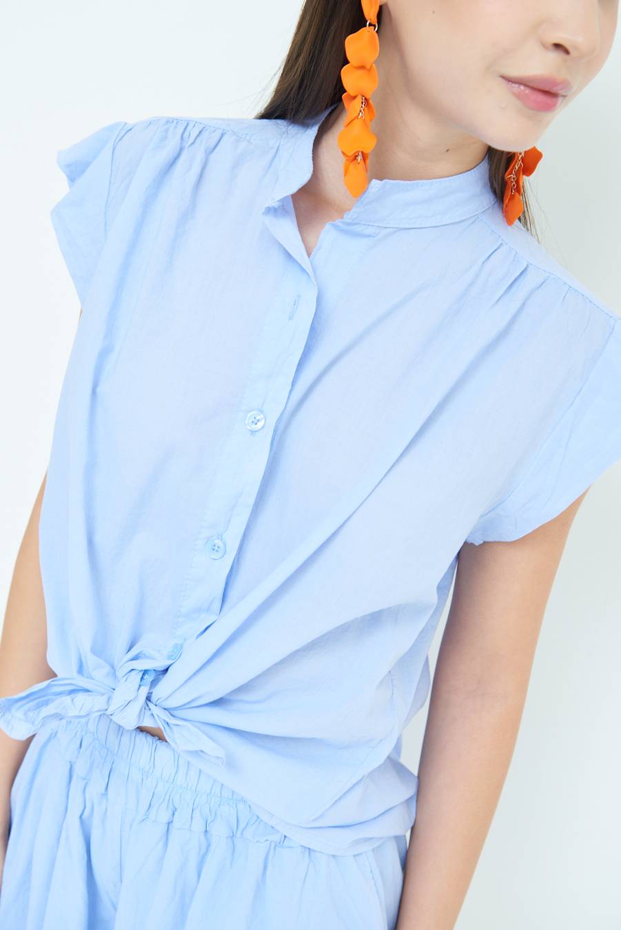 Kikisix CAMICIA SMANICATA CON NODO AZZURRO Fornitura limitata