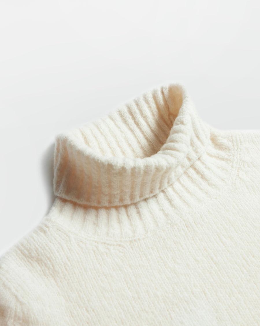 Scaglione TURTLE NECK SEAMLESS PUFFED MILK Offerta per la Festa della Mamma