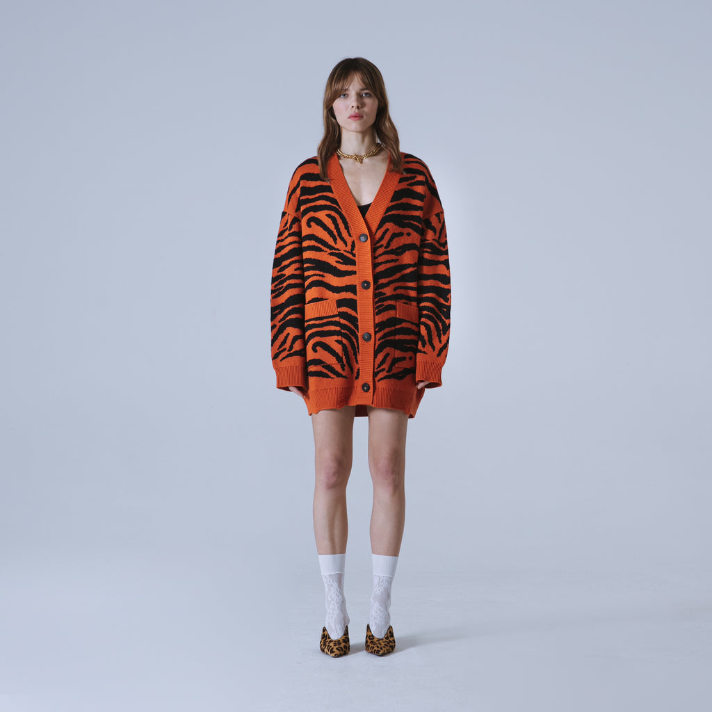 Sveta Milano Cardigan lungo jacquard Eléonore in arancione e nero I Più Venduti