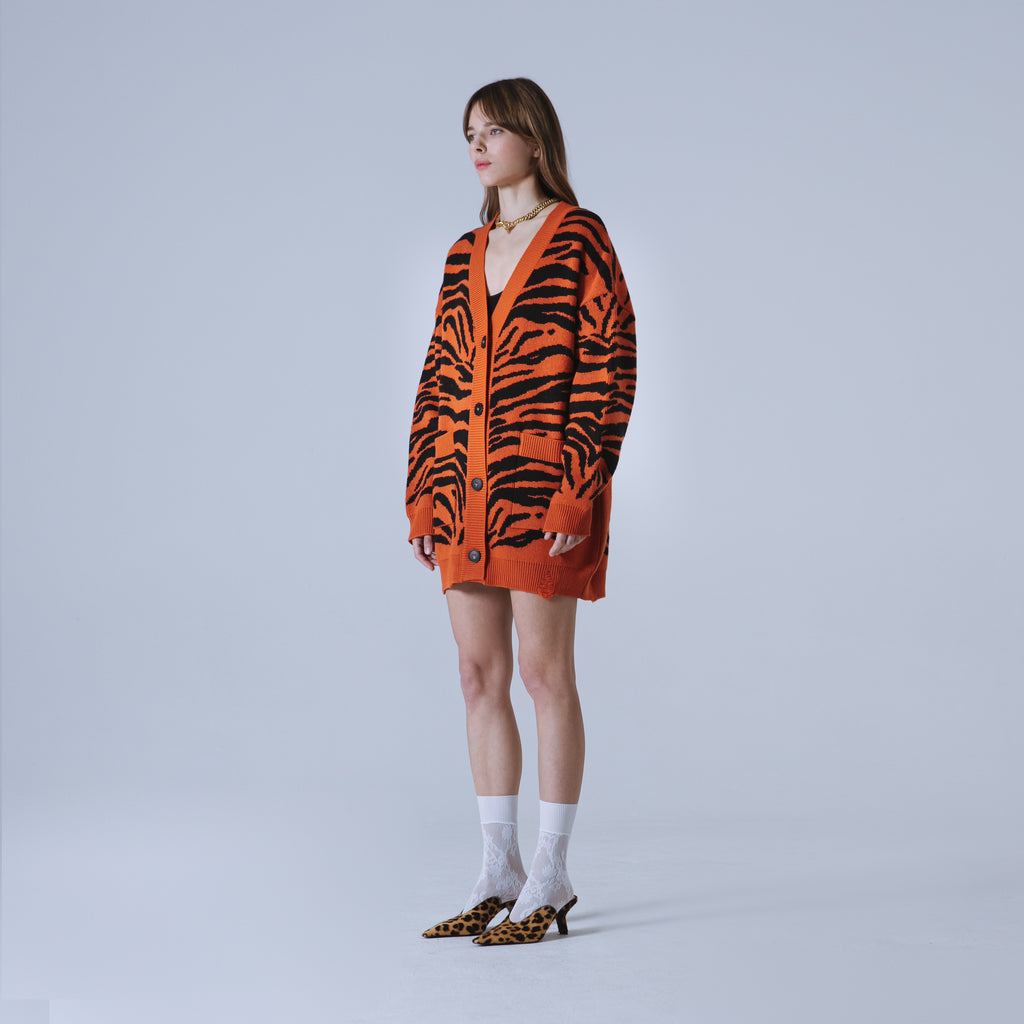 Sveta Milano Cardigan lungo jacquard Eléonore in arancione e nero I Più Venduti