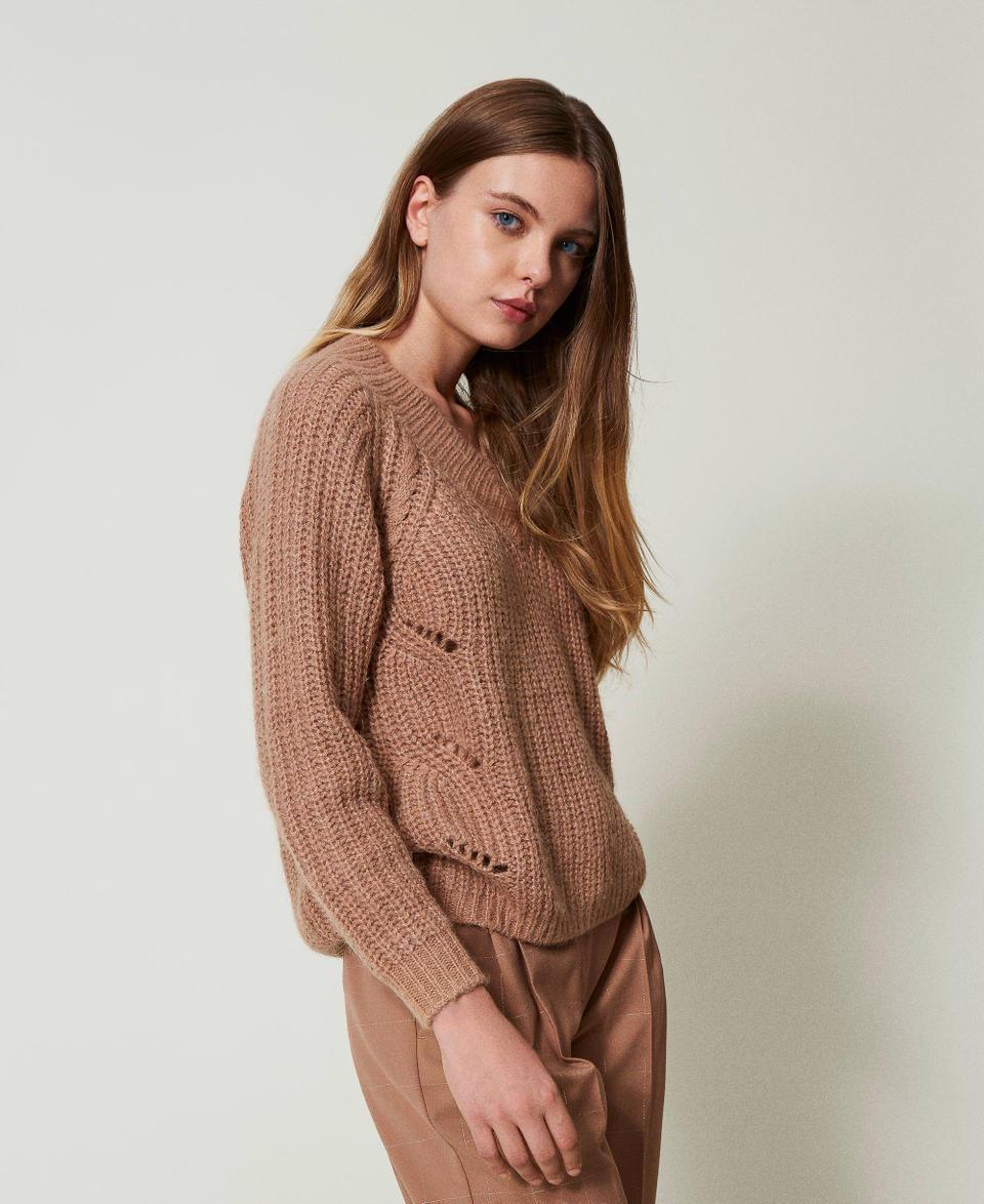 Twin Set Maglia a coste con trecce Ritorno libero