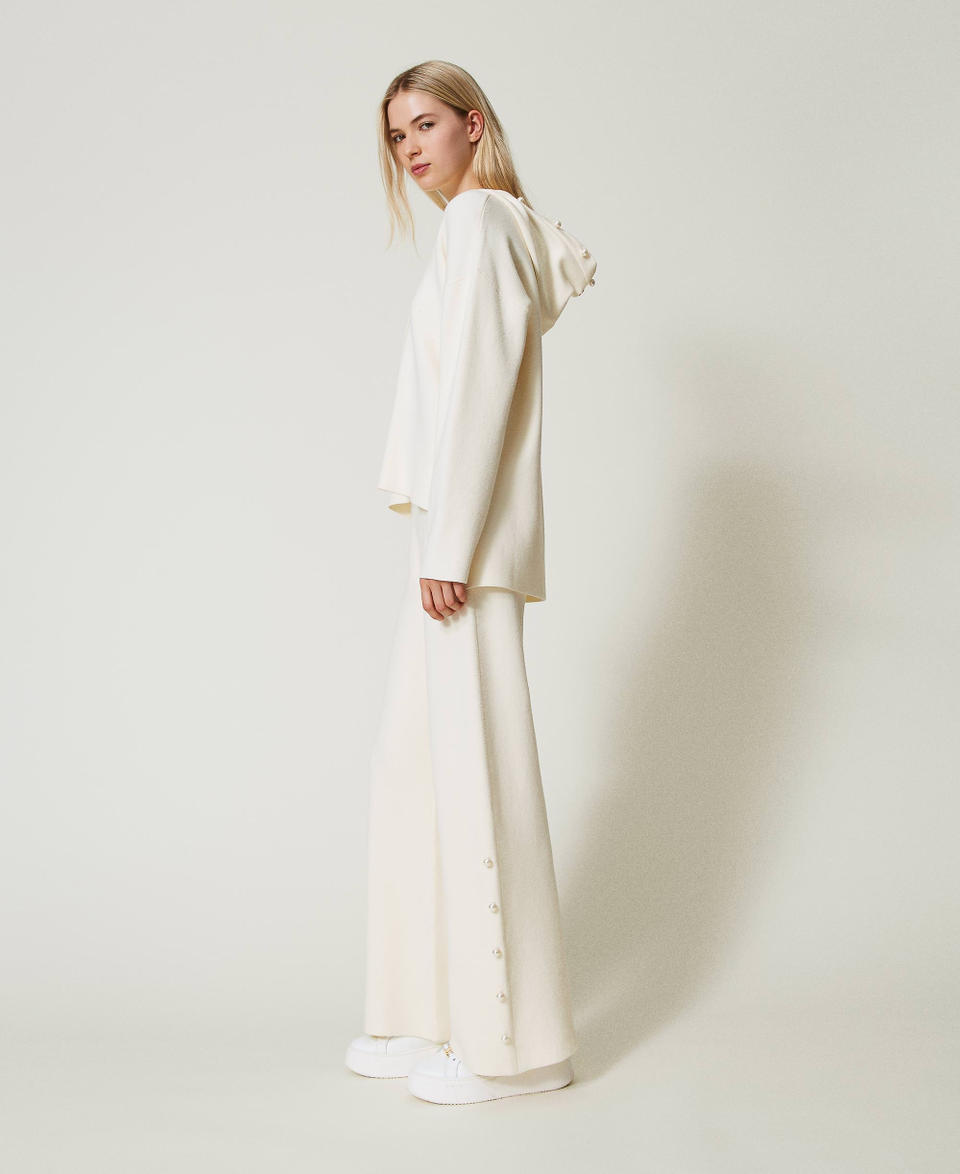 Twin Set Pantaloni wide leg in maglia con perle Sostegno trimestrale