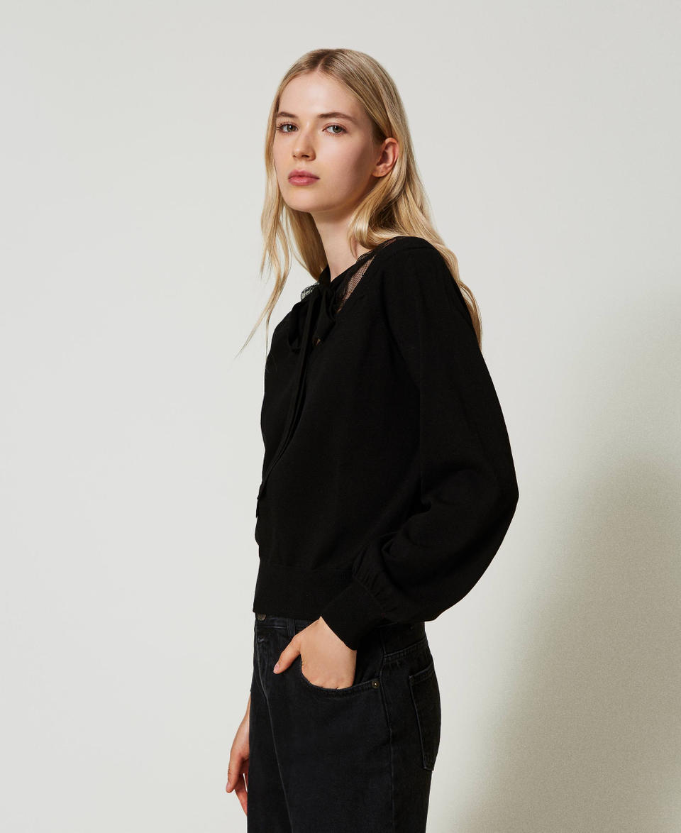 Twin Set Maglia con pizzo e fiocco Sconti questo mese