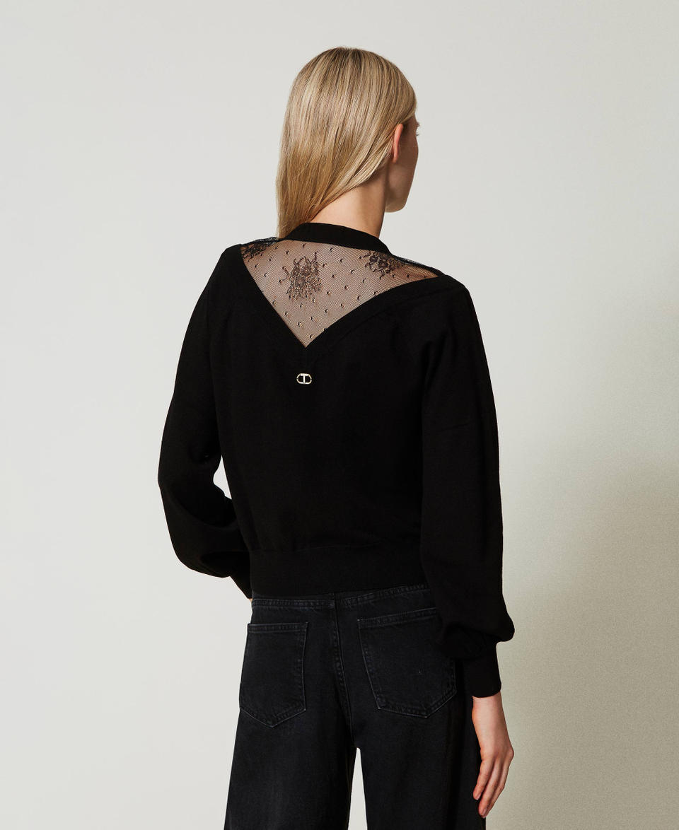 Twin Set Maglia con pizzo e fiocco Sconti questo mese